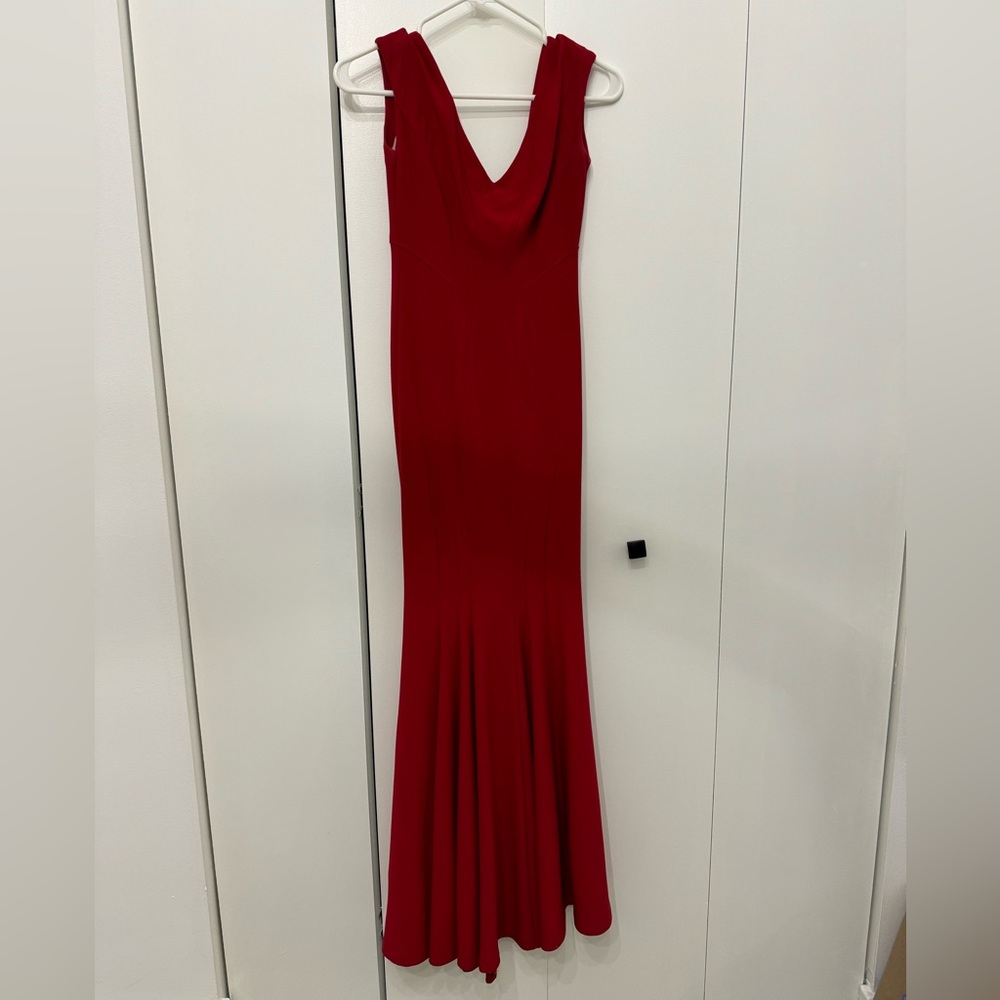 Beautiful red, body forming red dress. Perfect for a wedding or formal event